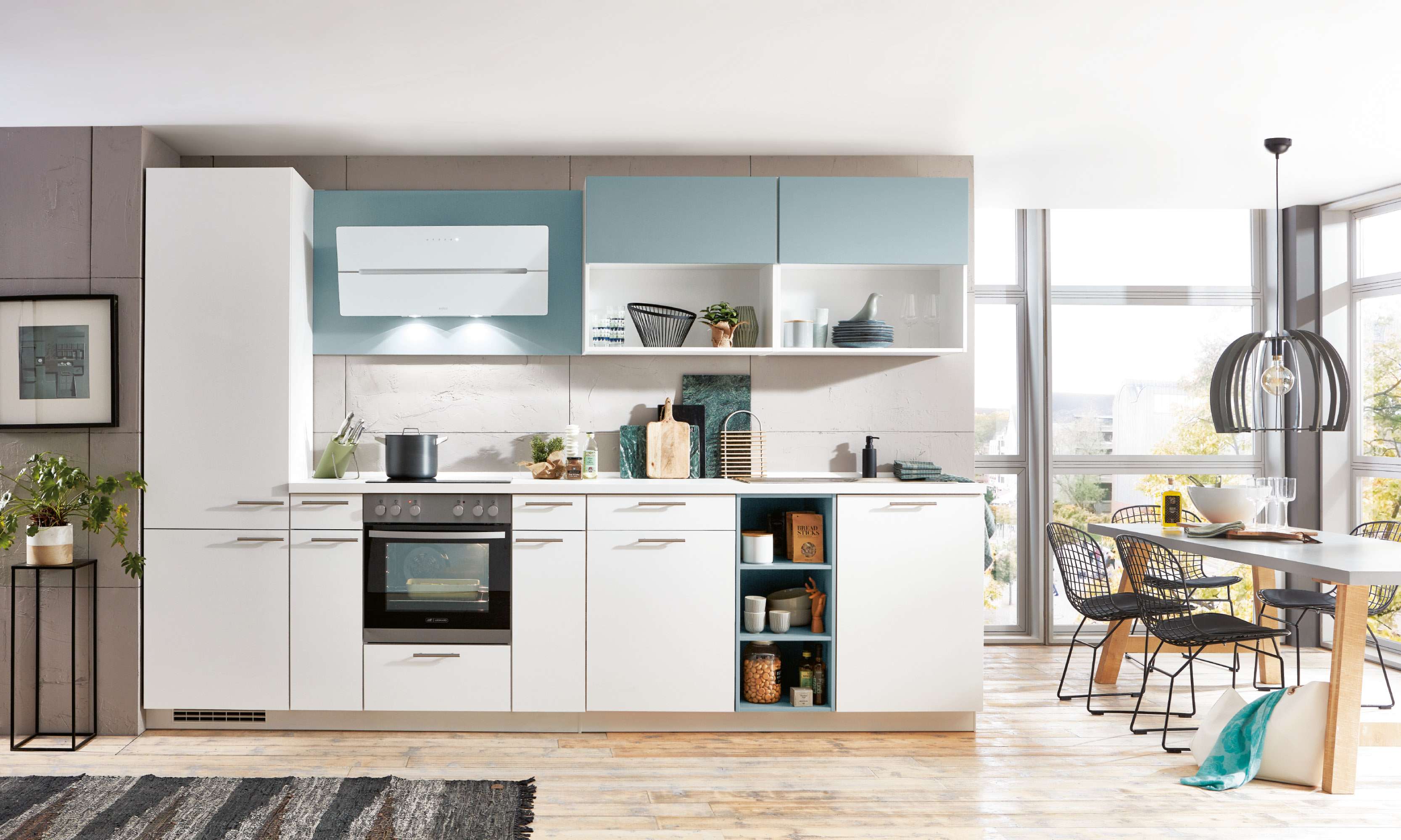 Abbildung einer Küchenzeile in  weiß mit Hellblauen Highlights